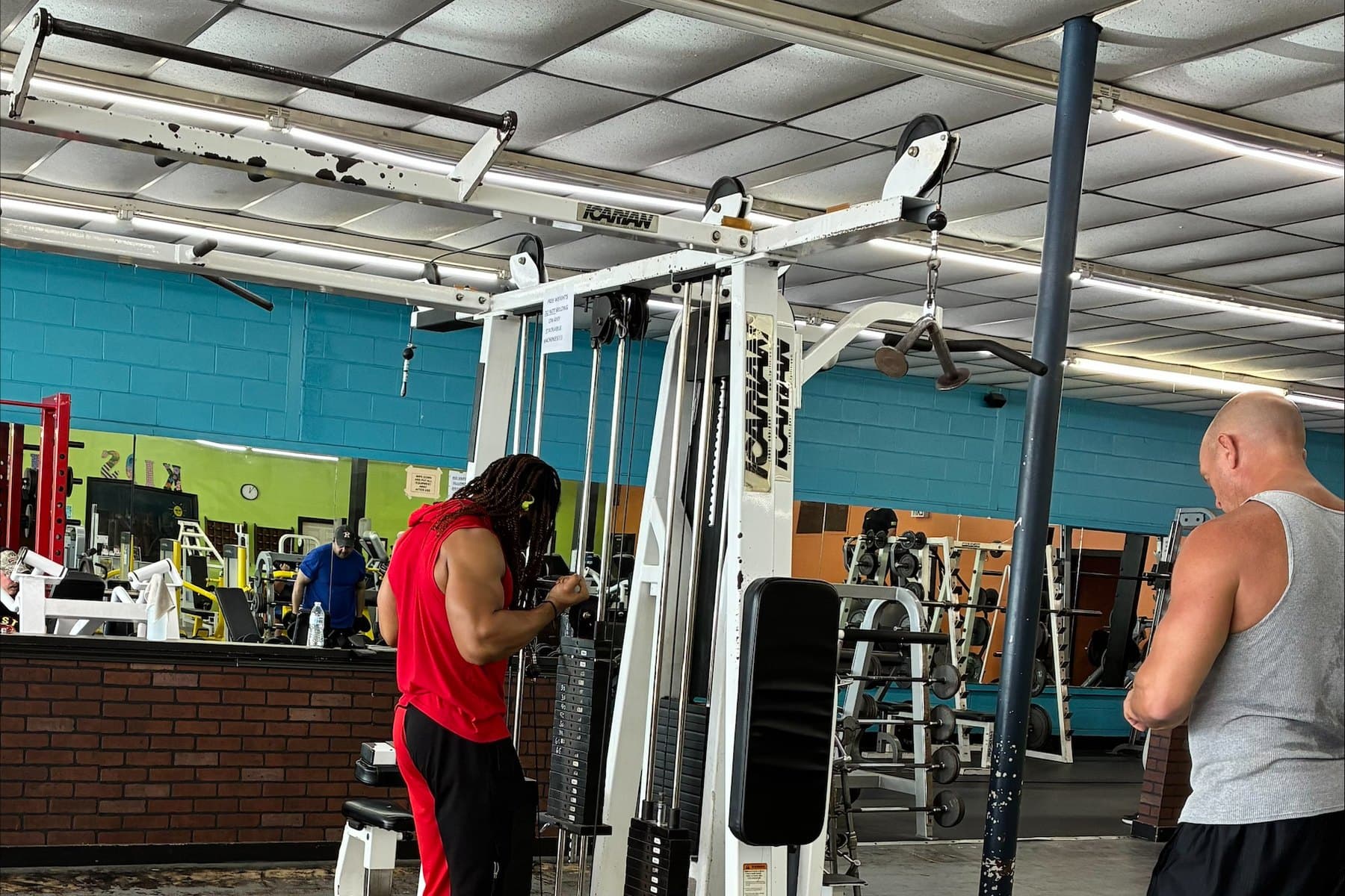 Members training on the functional trainer at Absolute Fitness